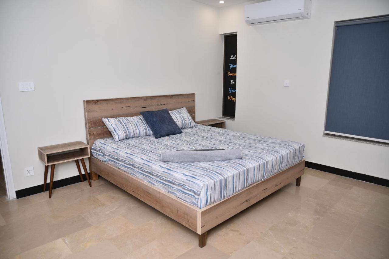 The Bliss Aparthotel Равалпинди Екстериор снимка